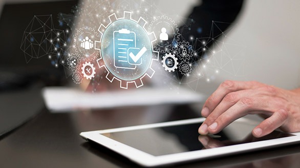AI Finance Solutions - employee using a tablet with Holographic symbols indicating compliance