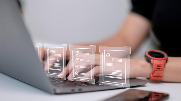 AI Finance Solutions - Holographic forms shown over a laptop keyboard